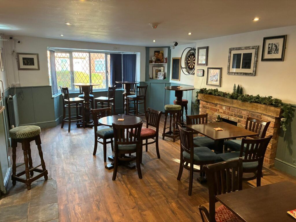 The Needlemakers lounge and dartboard